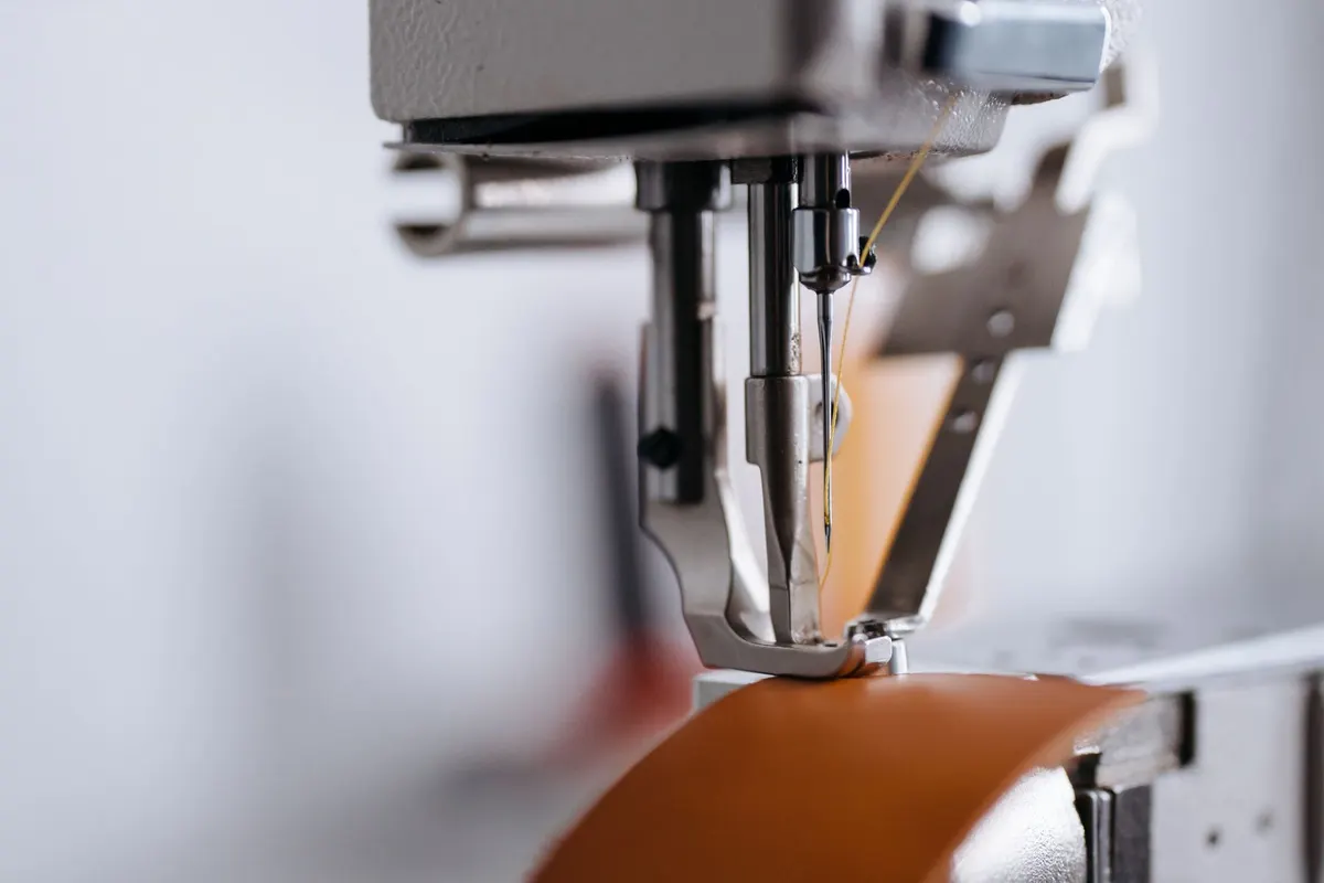 Sofa repair process for Bicho, Islamabad — measuring and stitching