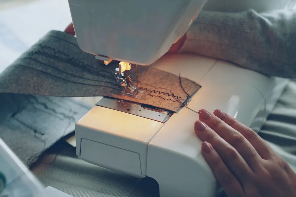 Sofa repair process for Cheena, Rawalpindi — measuring and stitching