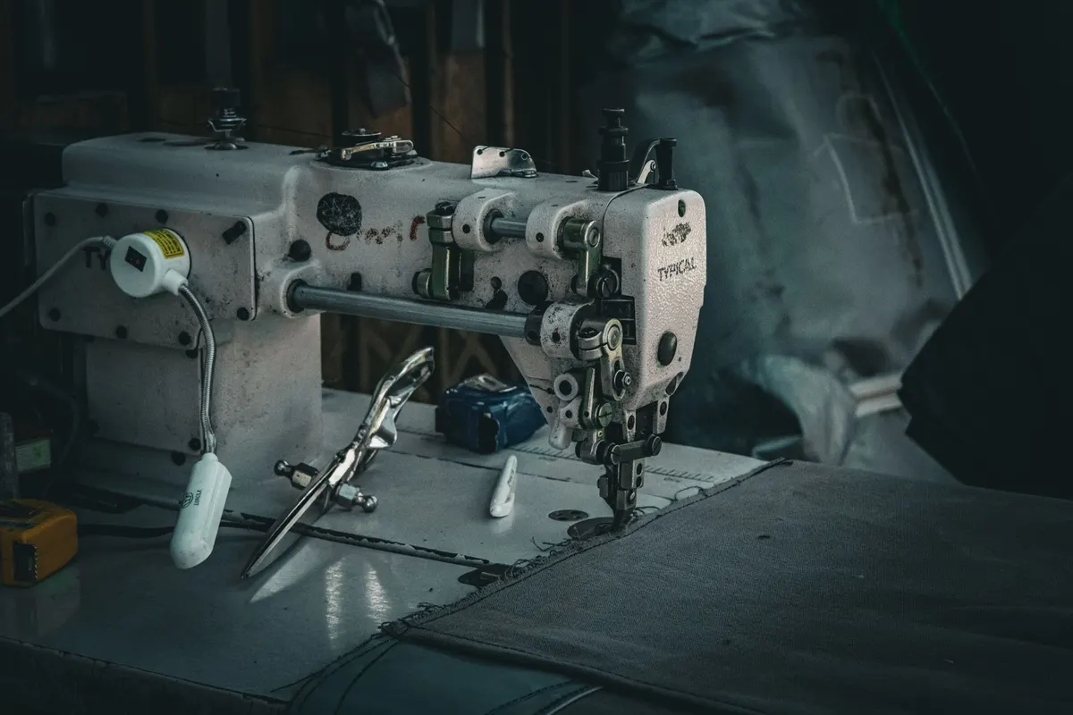 Sofa repair process for Malhas, Islamabad — measuring and stitching
